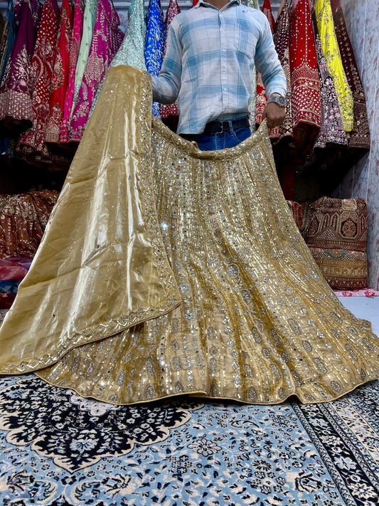 Heavy golden sequence lehenga