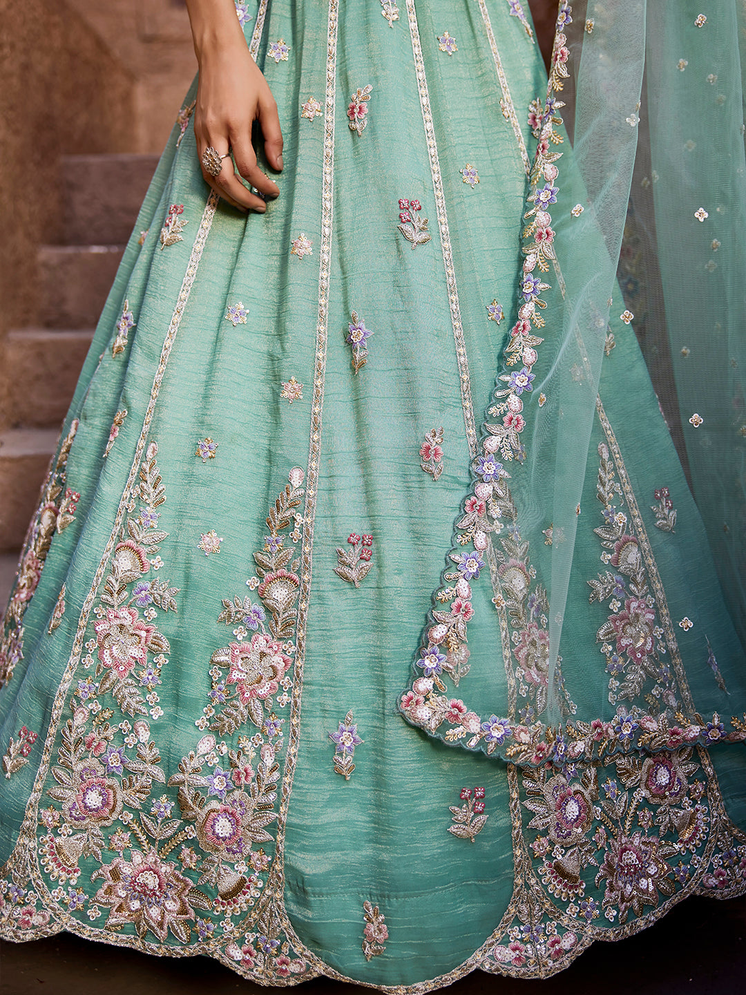 Pleasing green turquoise blue lehenga