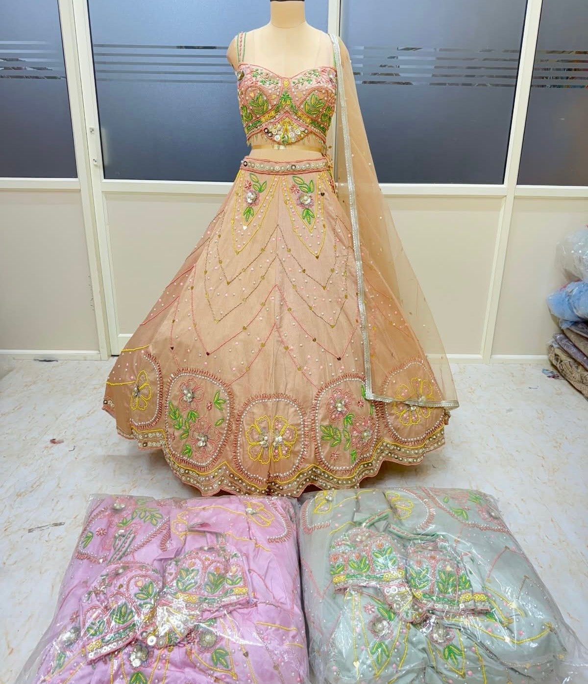 Peach light blue Pink gown lehenga