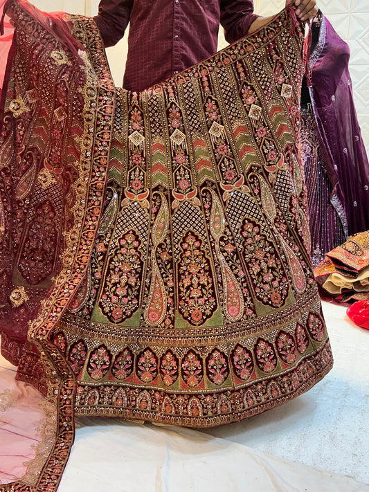 Fair peacock maroon bridal Lehenga