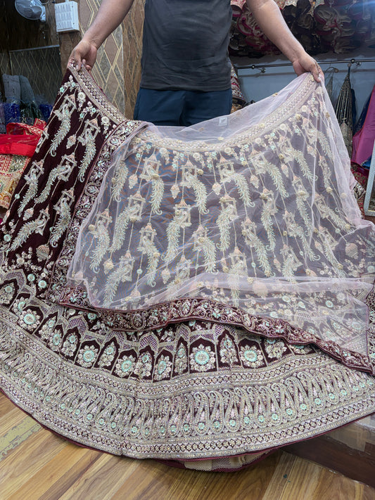 Pleasing maroon peacock bridal Lehenga