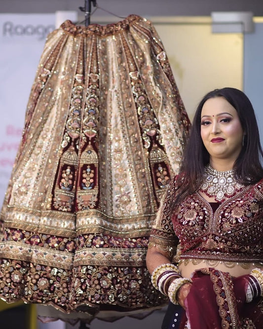 Lovely Dark maroon golden bridal lehenga ( happy customer)