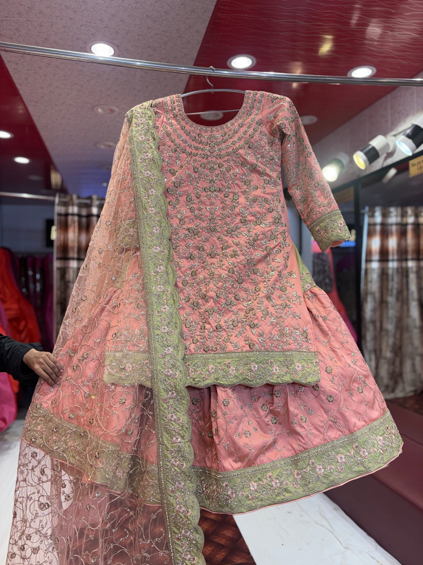 Engaging pink farshi gharara zardozi dabka handwork peplum dress lehenga