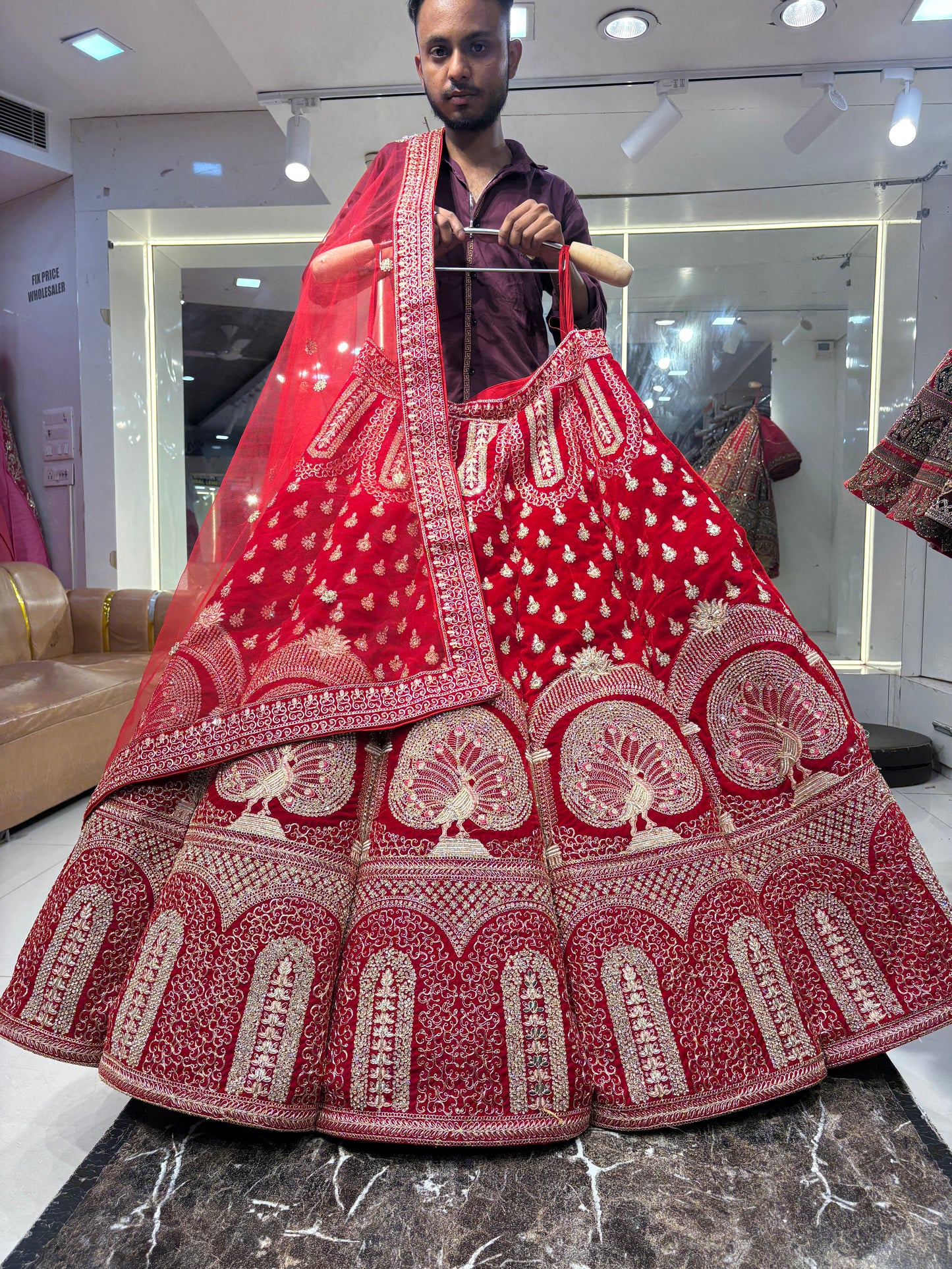 Khoobsurat peacock red ball bridal Lehenga