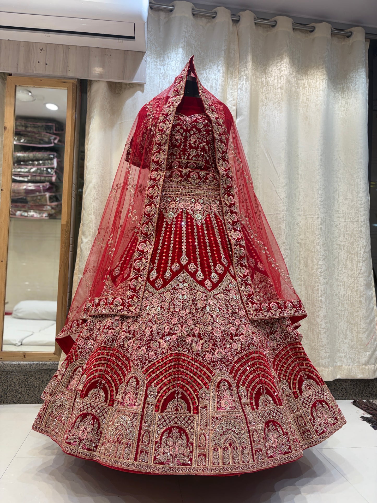 Stunning 12 kali red jhumka bridal Lehenga