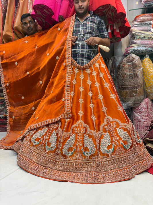 Khoobsurat orange peacock Lehenga