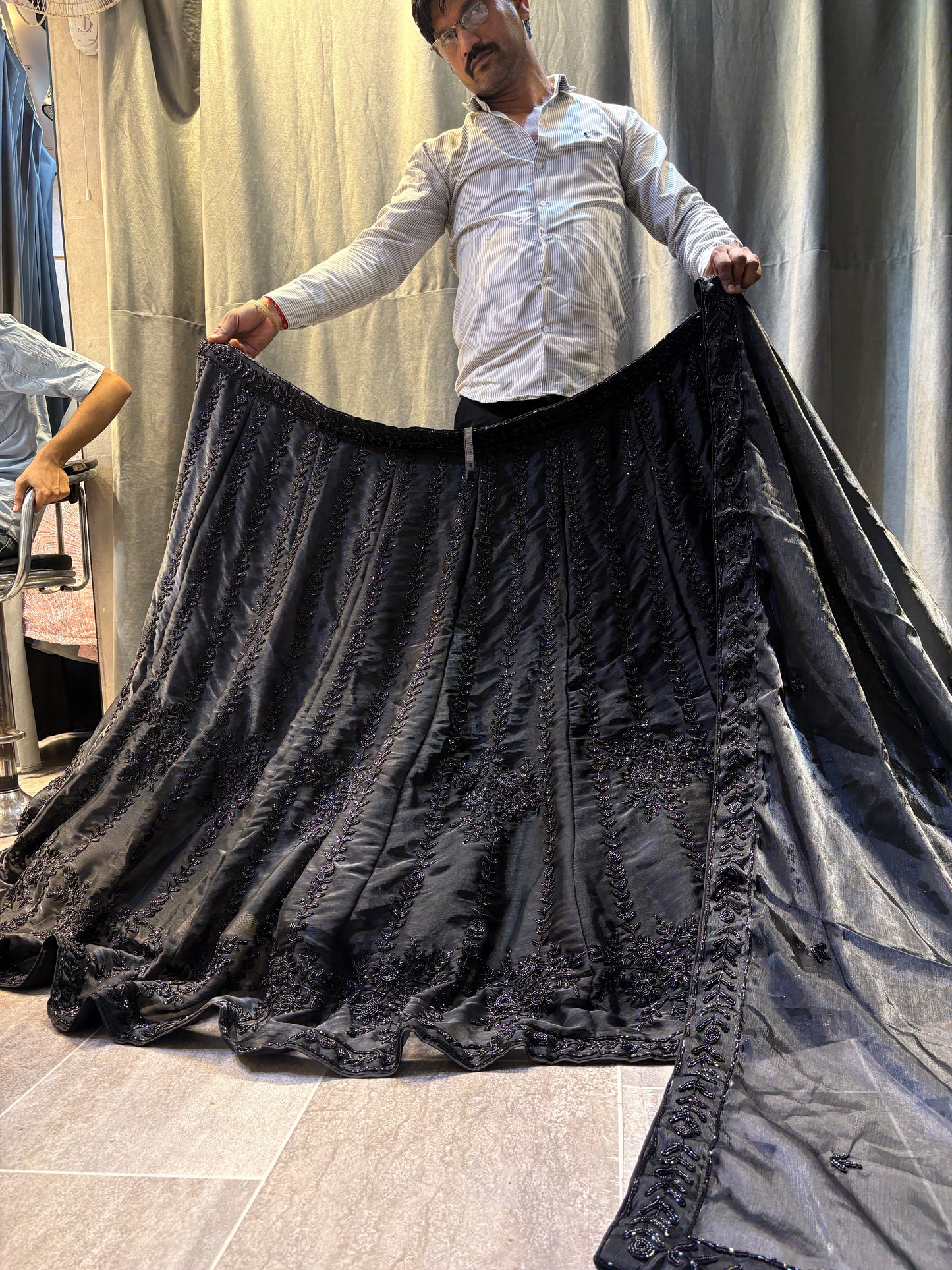 Lavishing black on black monotone handwork Lehenga