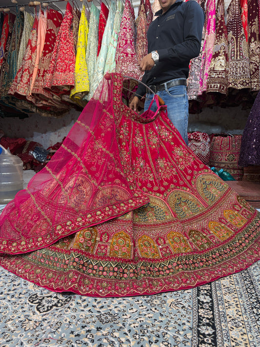 Awesome red peacock bridal Lehenga