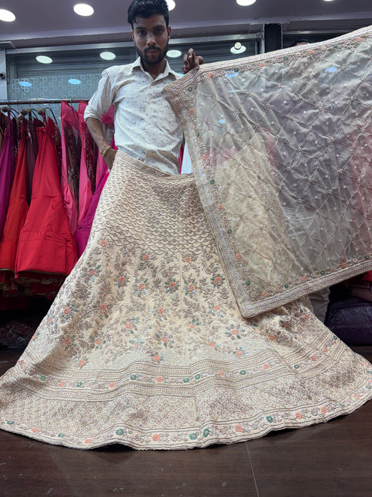 Pleasing golden baby pink beige zardozi dabka handwork handmade bridal Lehenga