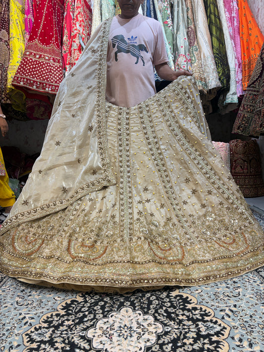 Lovely golden pearl handwork Lehenga