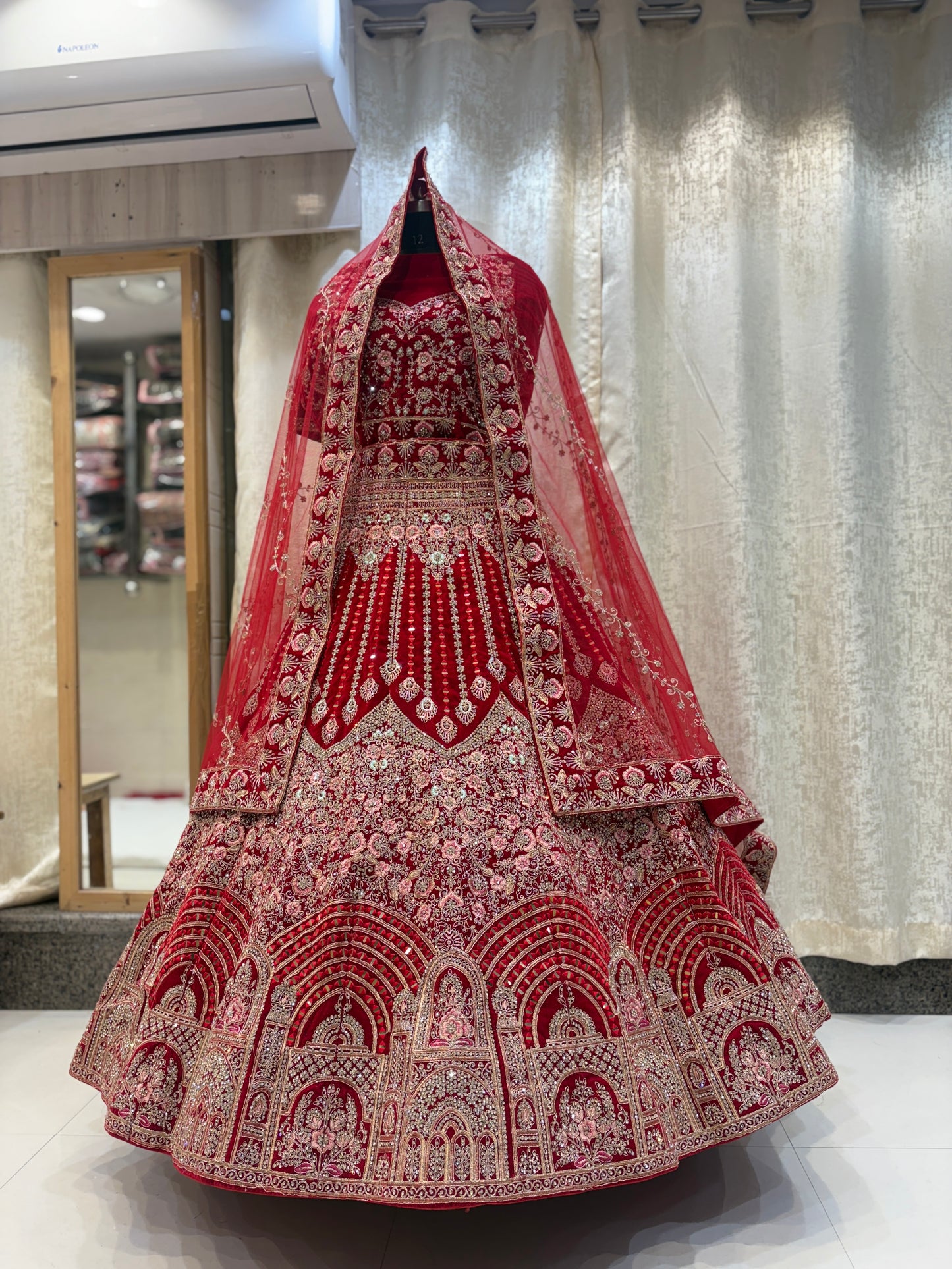 Khoobsurat jhumka red Bridal lehenga Happy Customer
