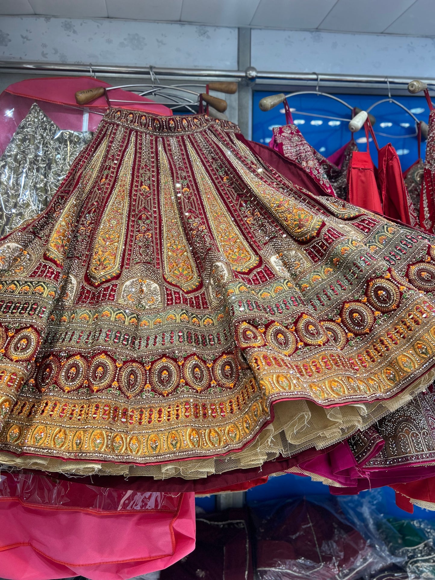 Wow maroon golden bridal lehenga