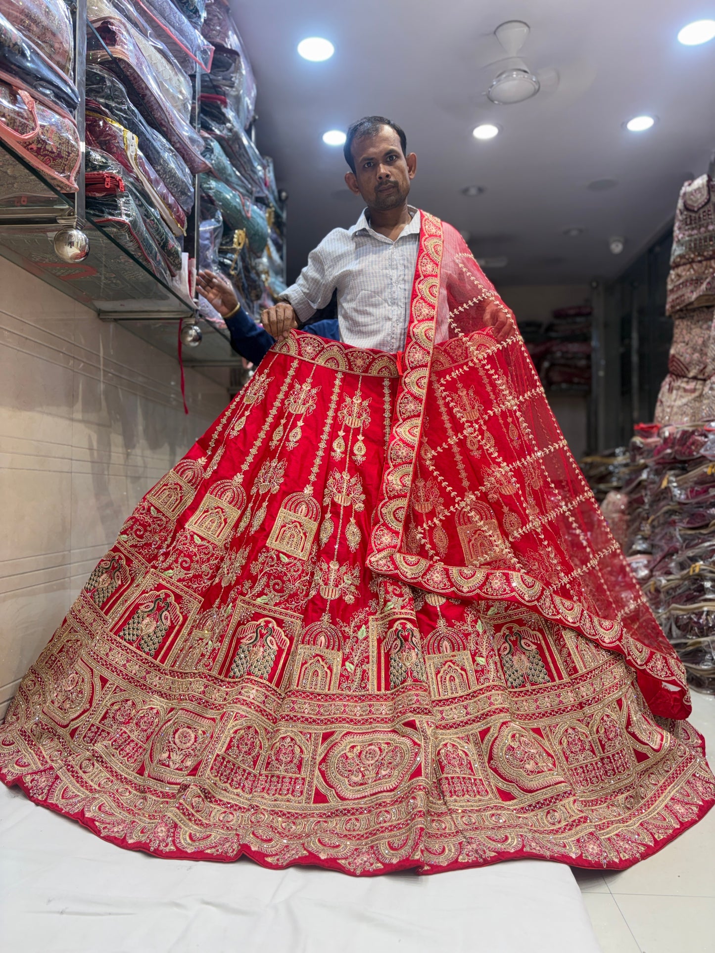 Delightful Rani pink peacock Bridal Lehenga