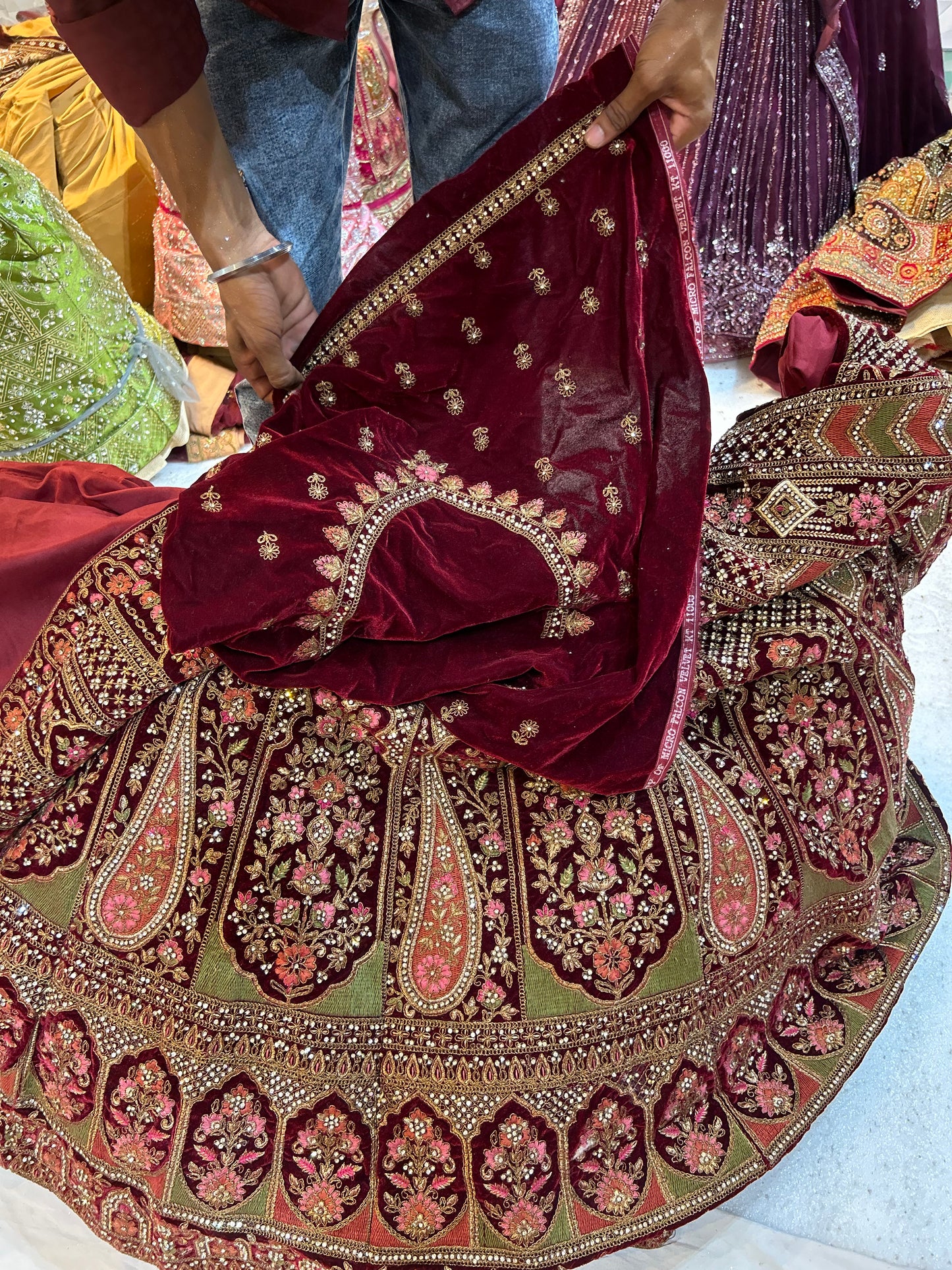 Fair peacock maroon bridal Lehenga