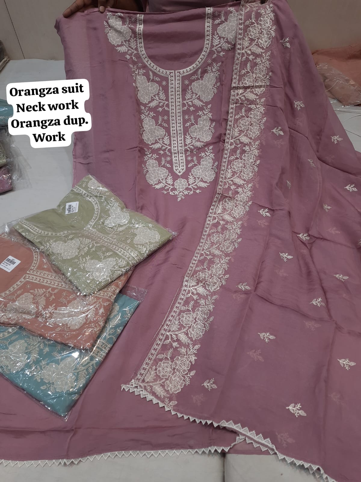 Fantastic pink organza women suits & dress material