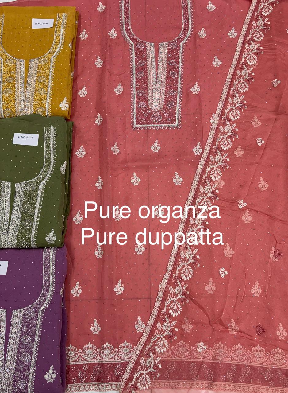 Something different organza peach Unstitched suit ( free size )