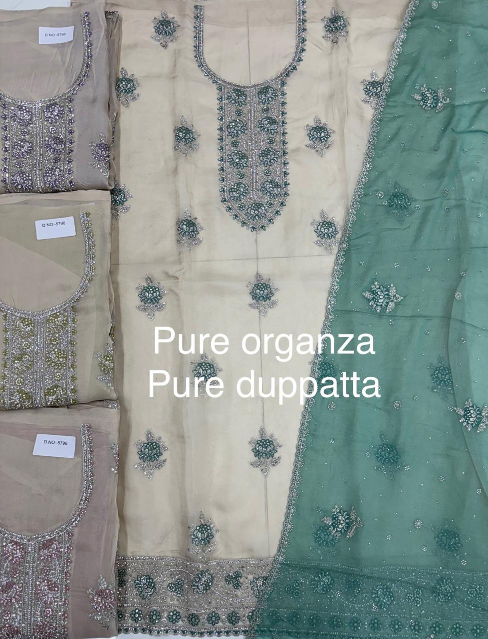 Good looking white sky blue Unstitched suit ( free size )