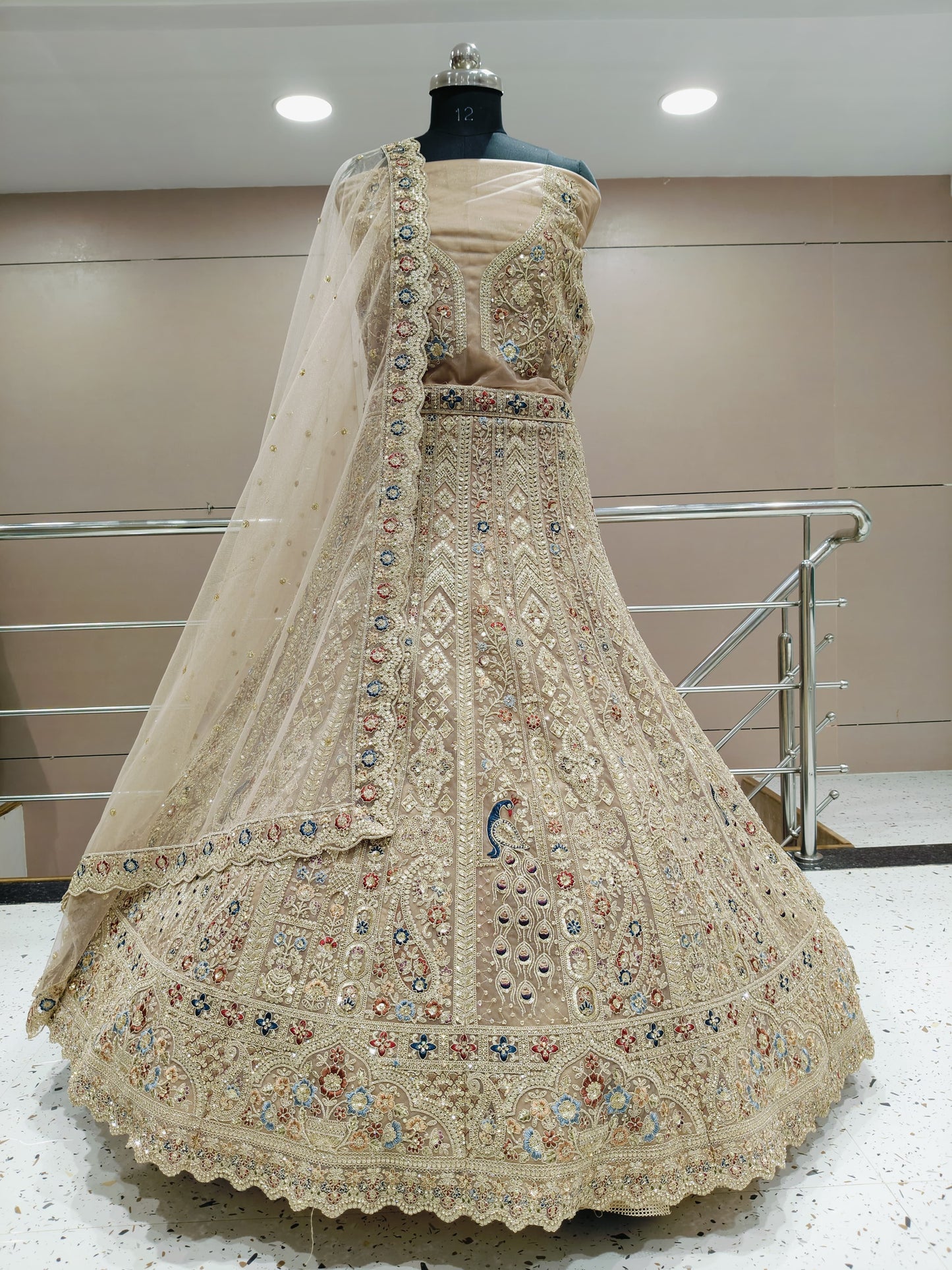Designer Peacock beige skin color Lehenga with cut work border