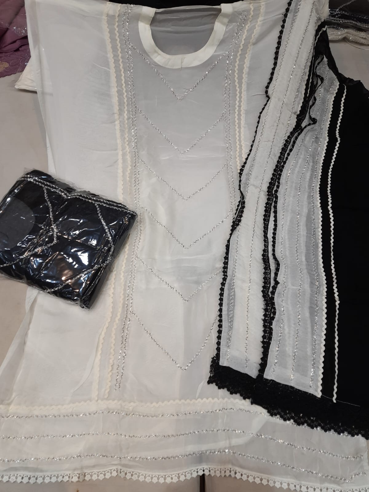 Tremendous white Unstitched suit ( free size )