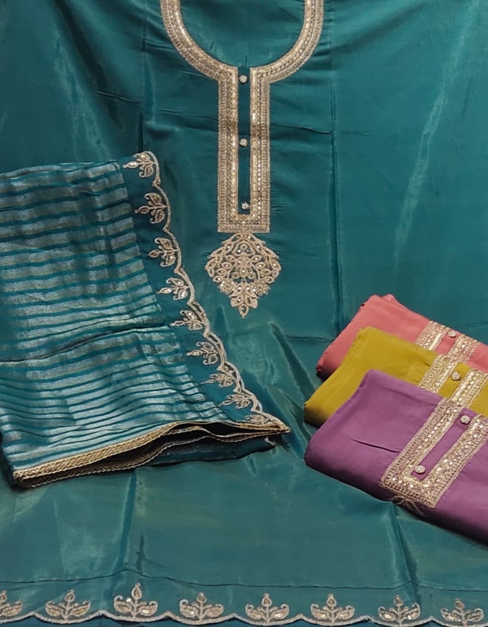 Good looking dark green roman silk Unstitched suit ( free size )