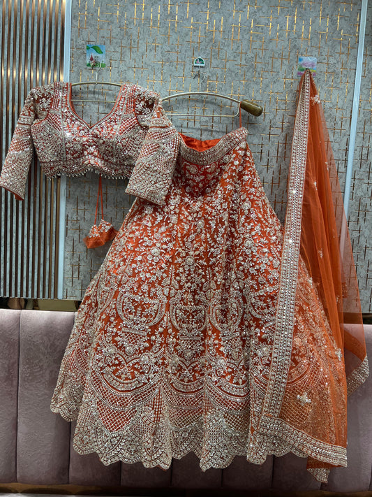 Tremendous orange crop top Lehenga