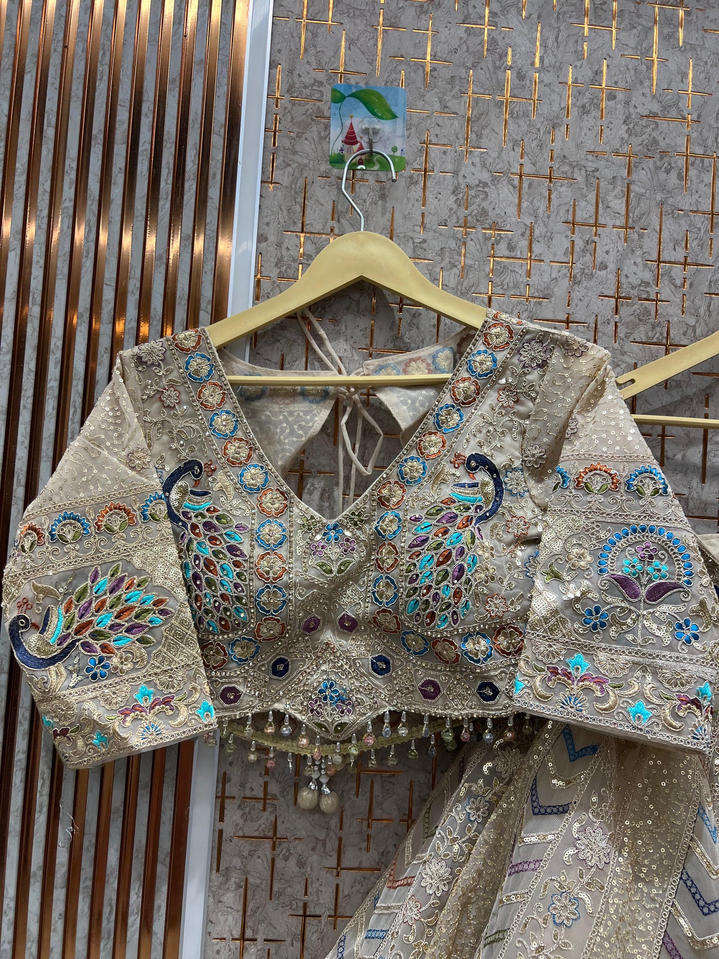 Awesome peach beige peacock crop top Lehenga