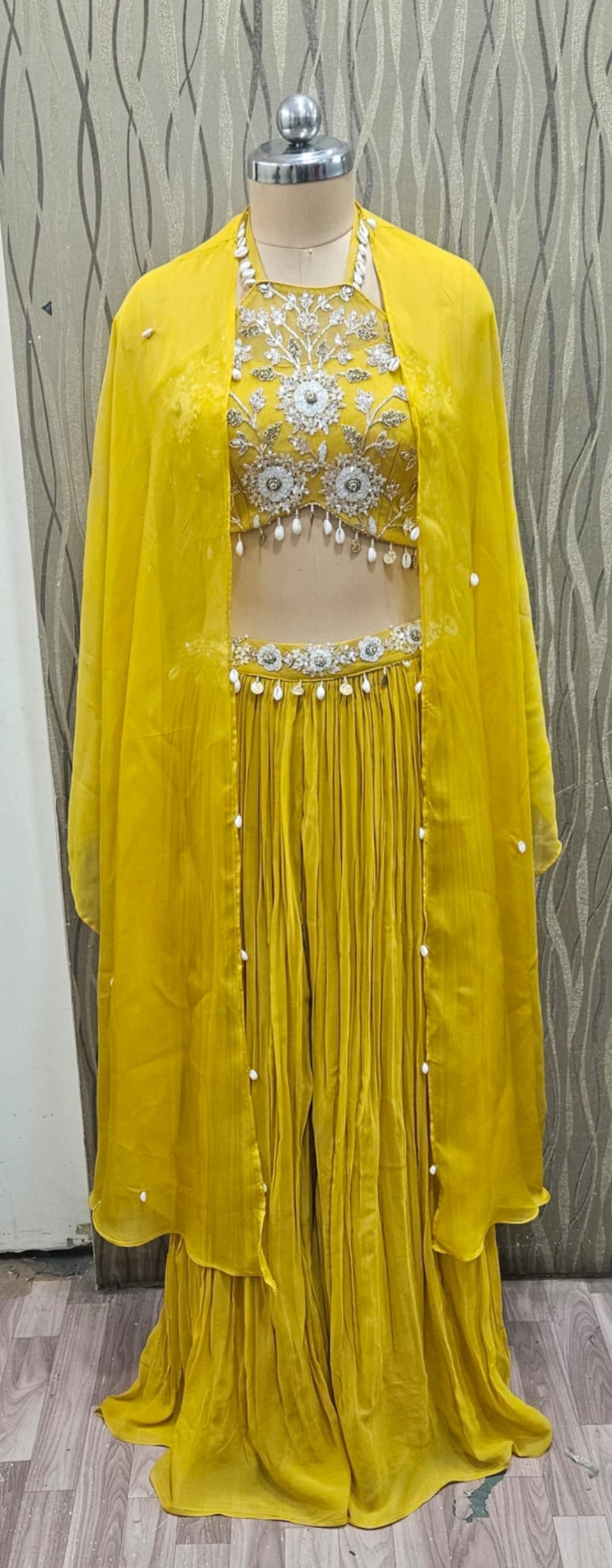 Pleasing green jacket crop top Lehenga