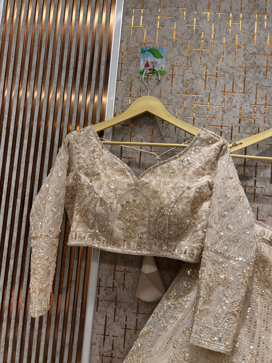 Stunning beige baby pink crop top Lehenga