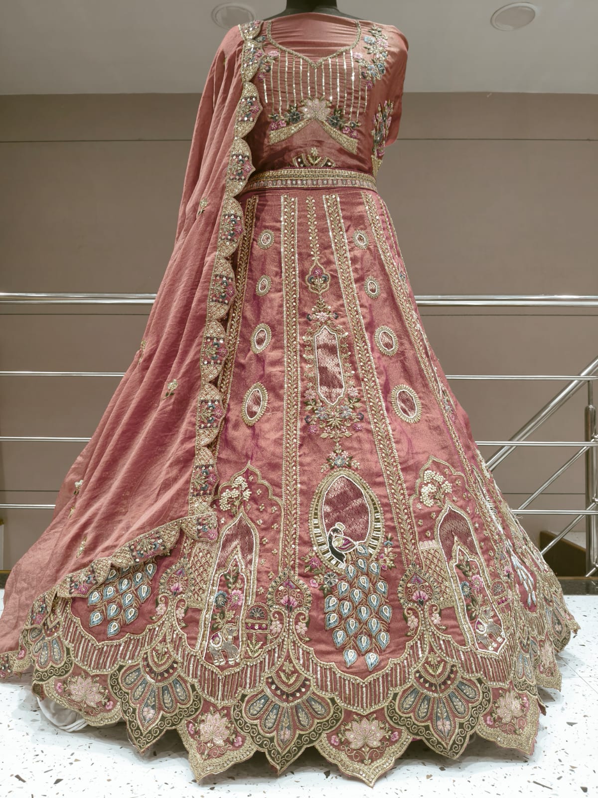 Khoobsurat peach peacock Lehenga