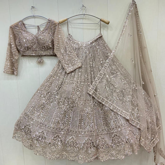 Eye catching Beige golden crop top Lehenga