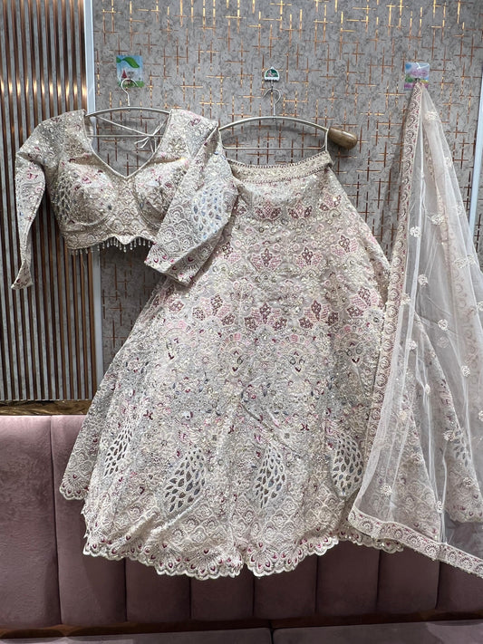 Tremendous peacock white crop top Lehenga