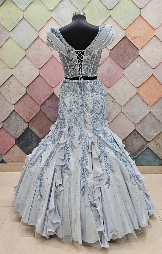 GAURAV GUPTA stunning designer outfit in a beautiful ice-blue shade, crafted with complete hand work on both front and back fish-cut crop top lehenga