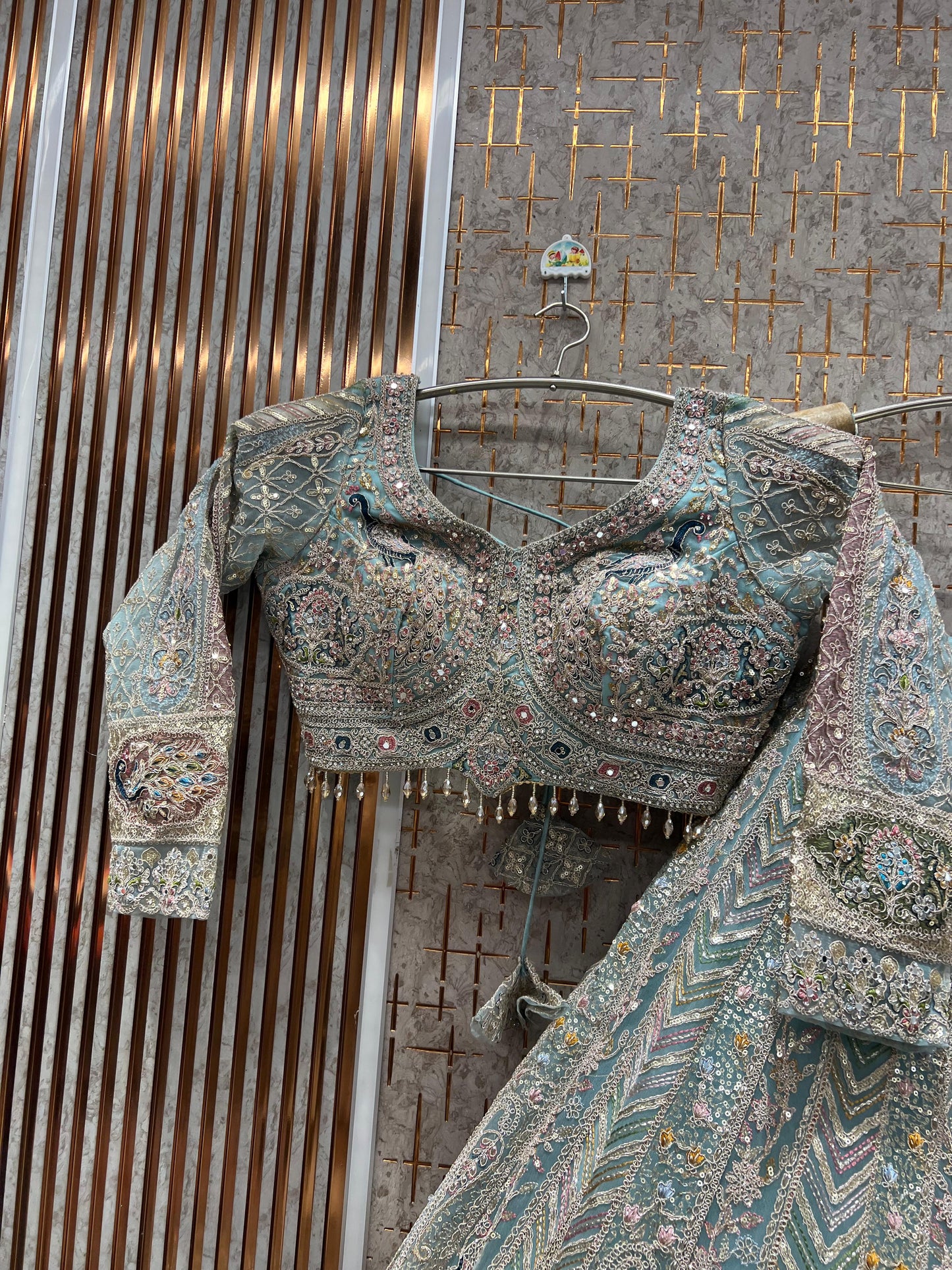 Embellished light peach peacock crop top Lehenga