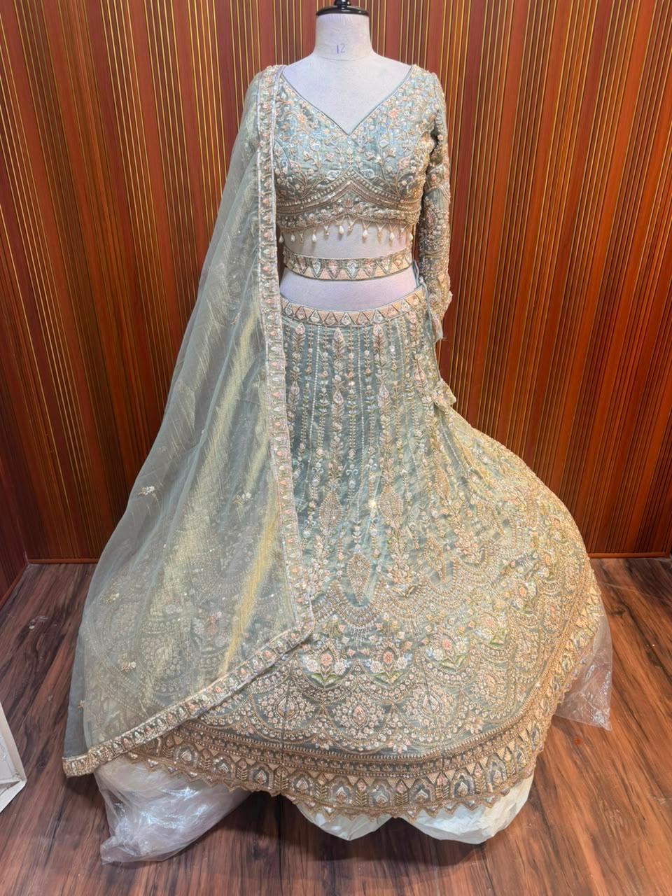 Pink golden green net crop top Lehenga