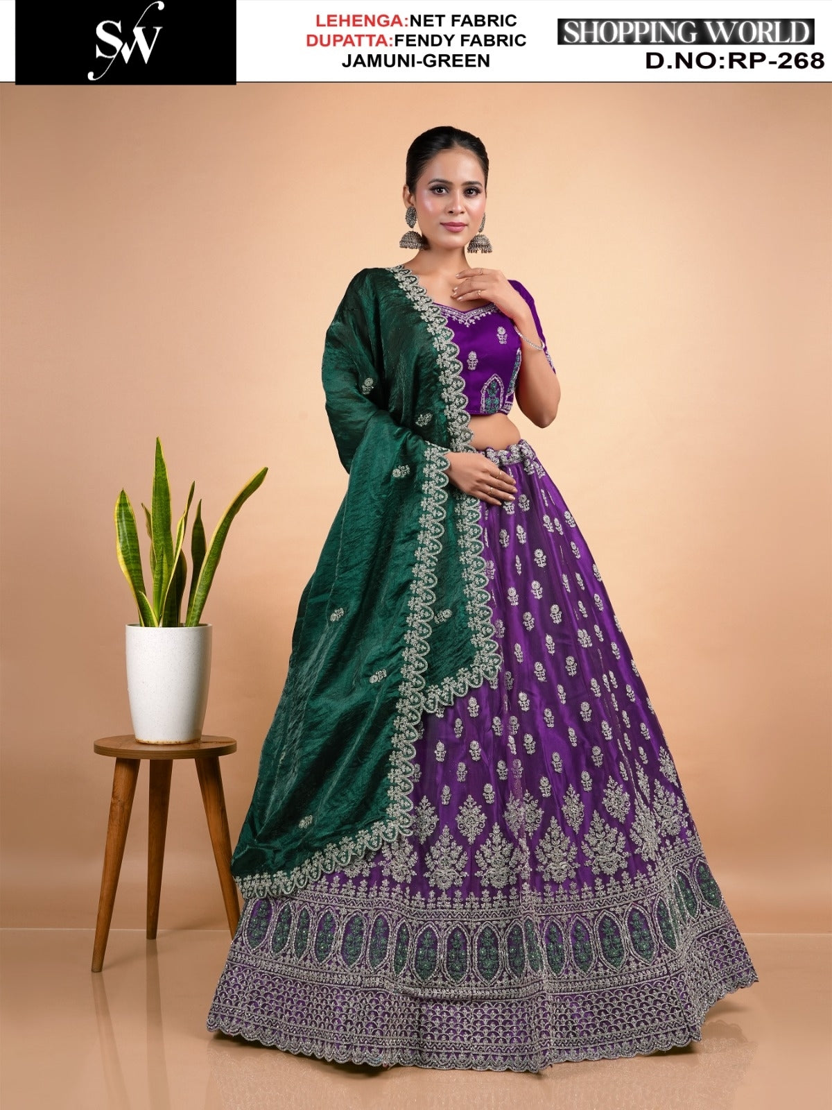 Tremendous Rama green Rani Net Lehenga