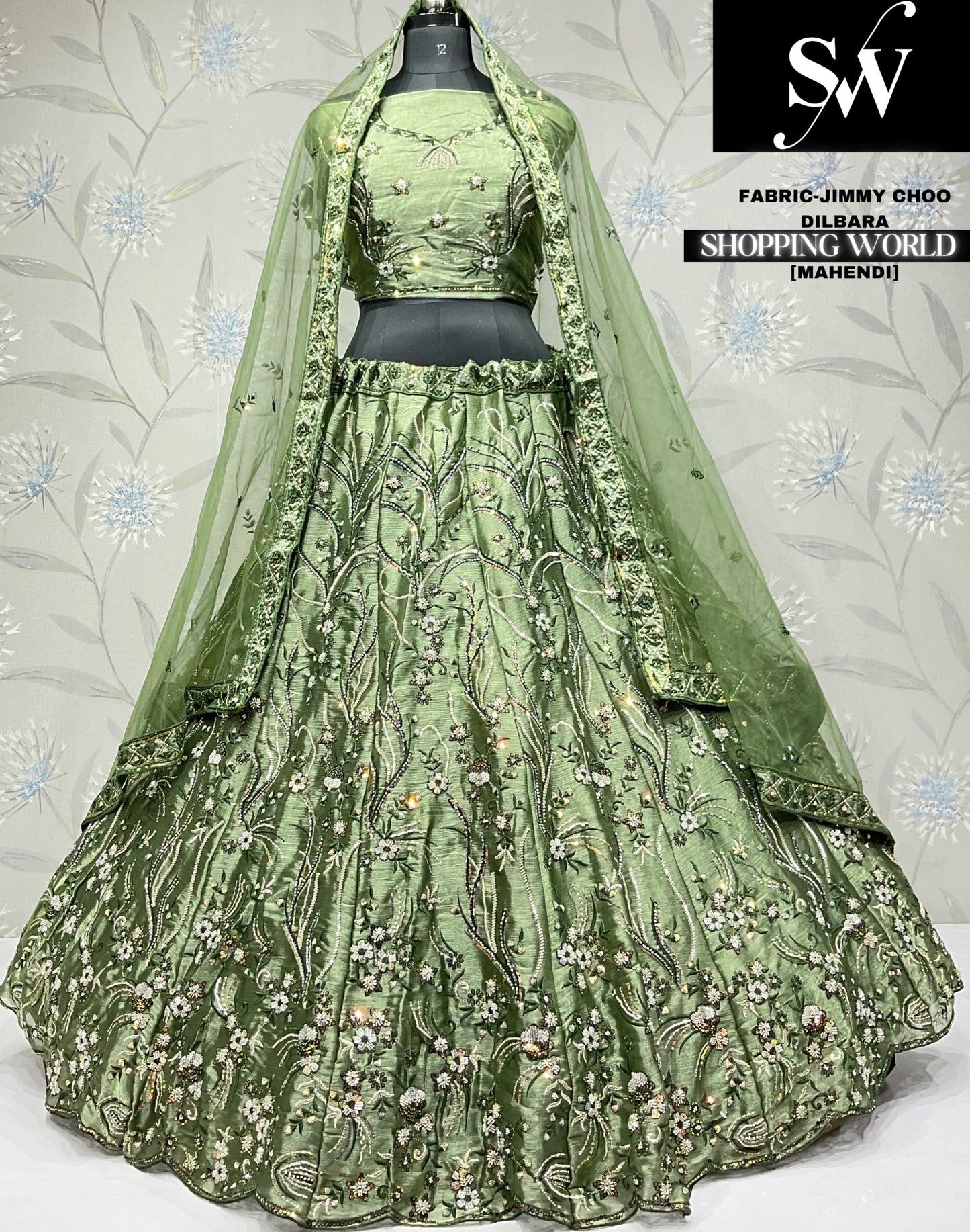 Eye catching mehendi green Jimmi Choo Dilbara Lehenga