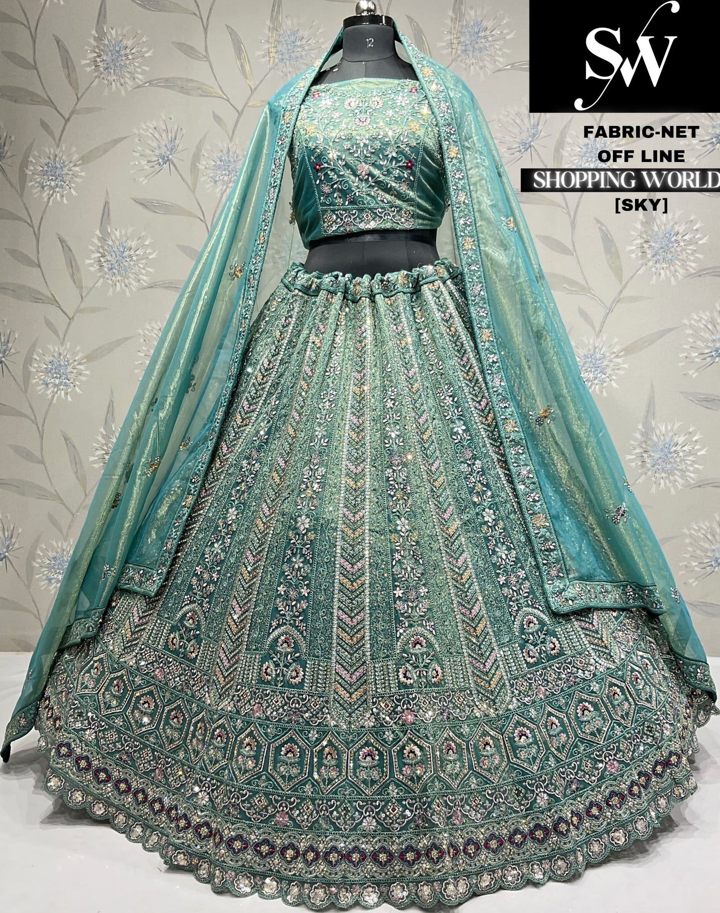 Encantadora lehenga de red azul cielo