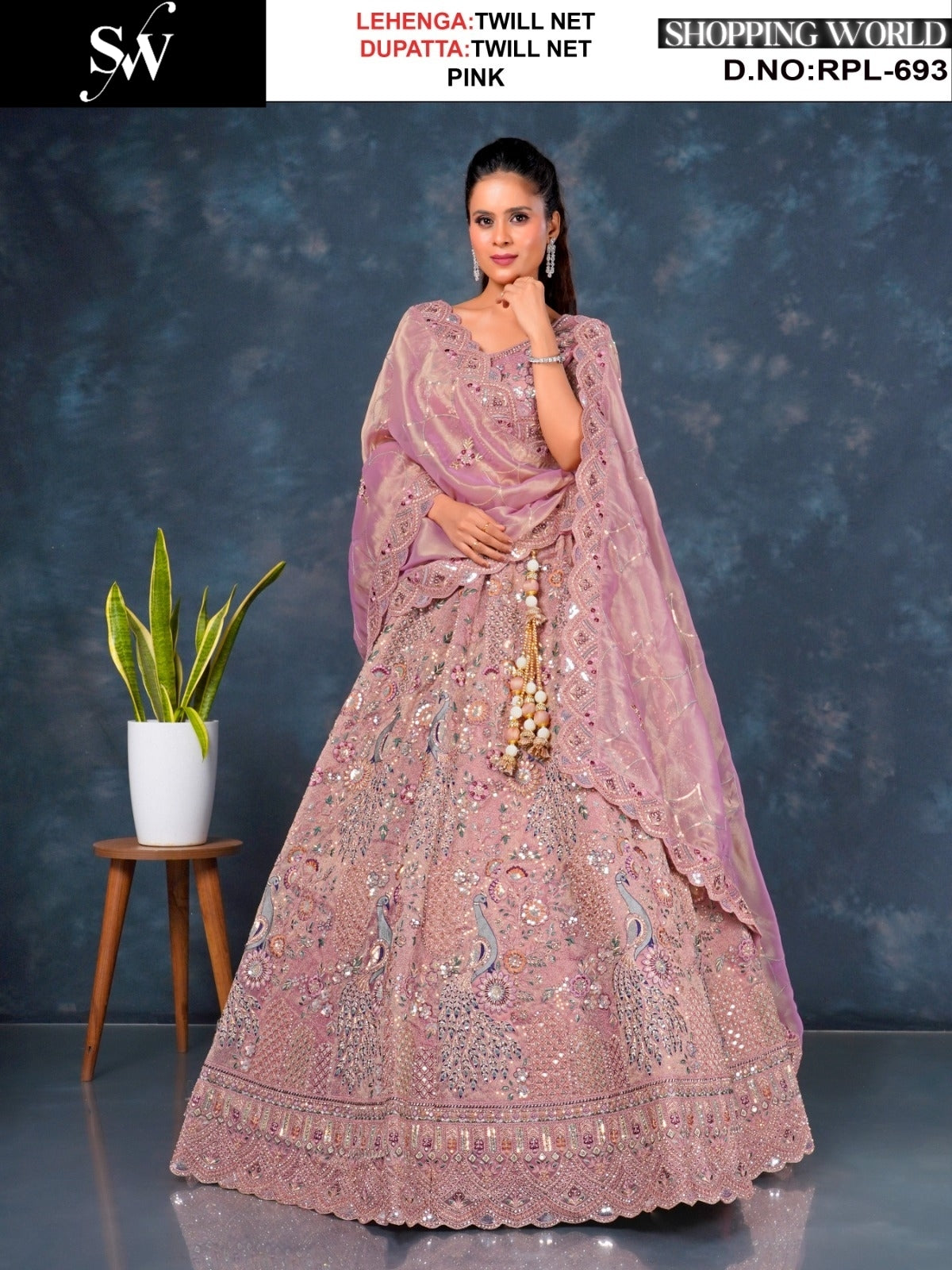 Attractive Rust peach peacock Twill Net Lehenga