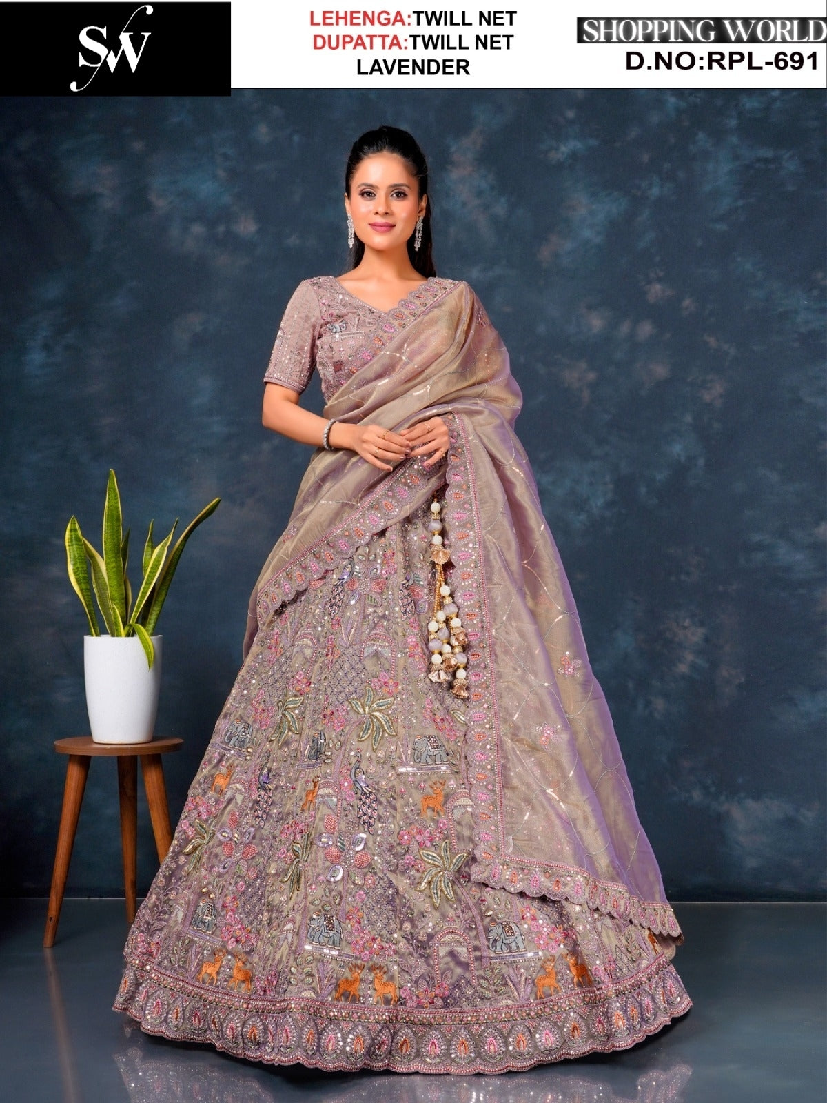 Engaging pink Peacock Twill Net Lehenga