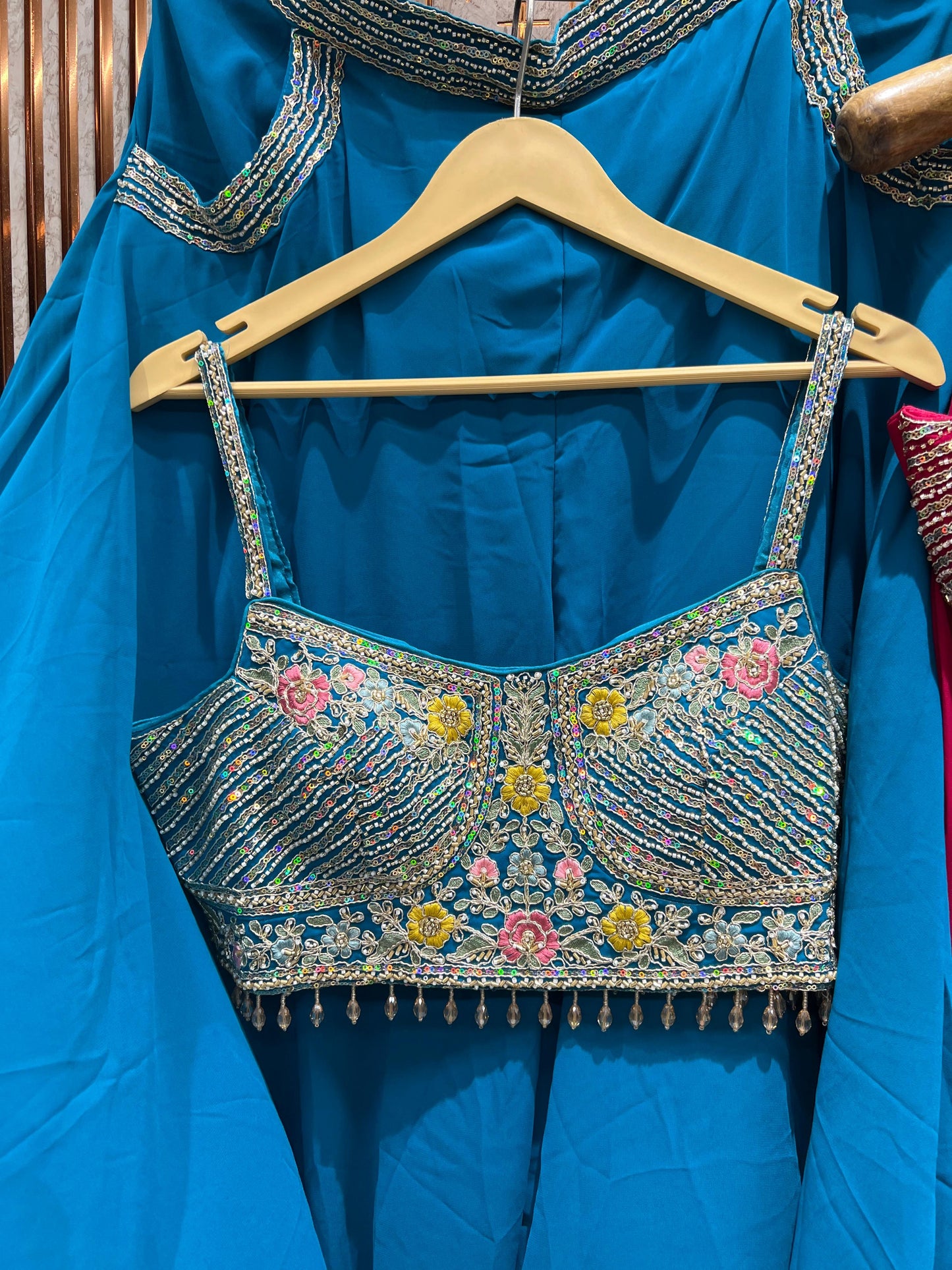 Good looking pink white yellow blue crop top lehenga