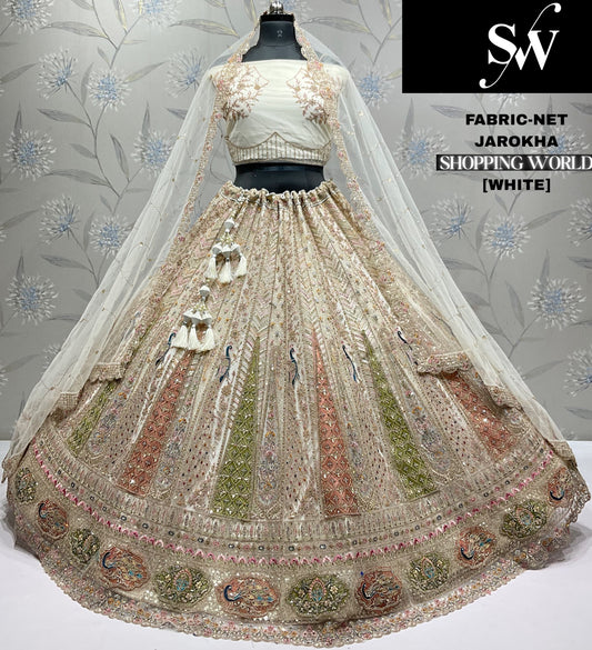 Good looking white peacock net Lehenga