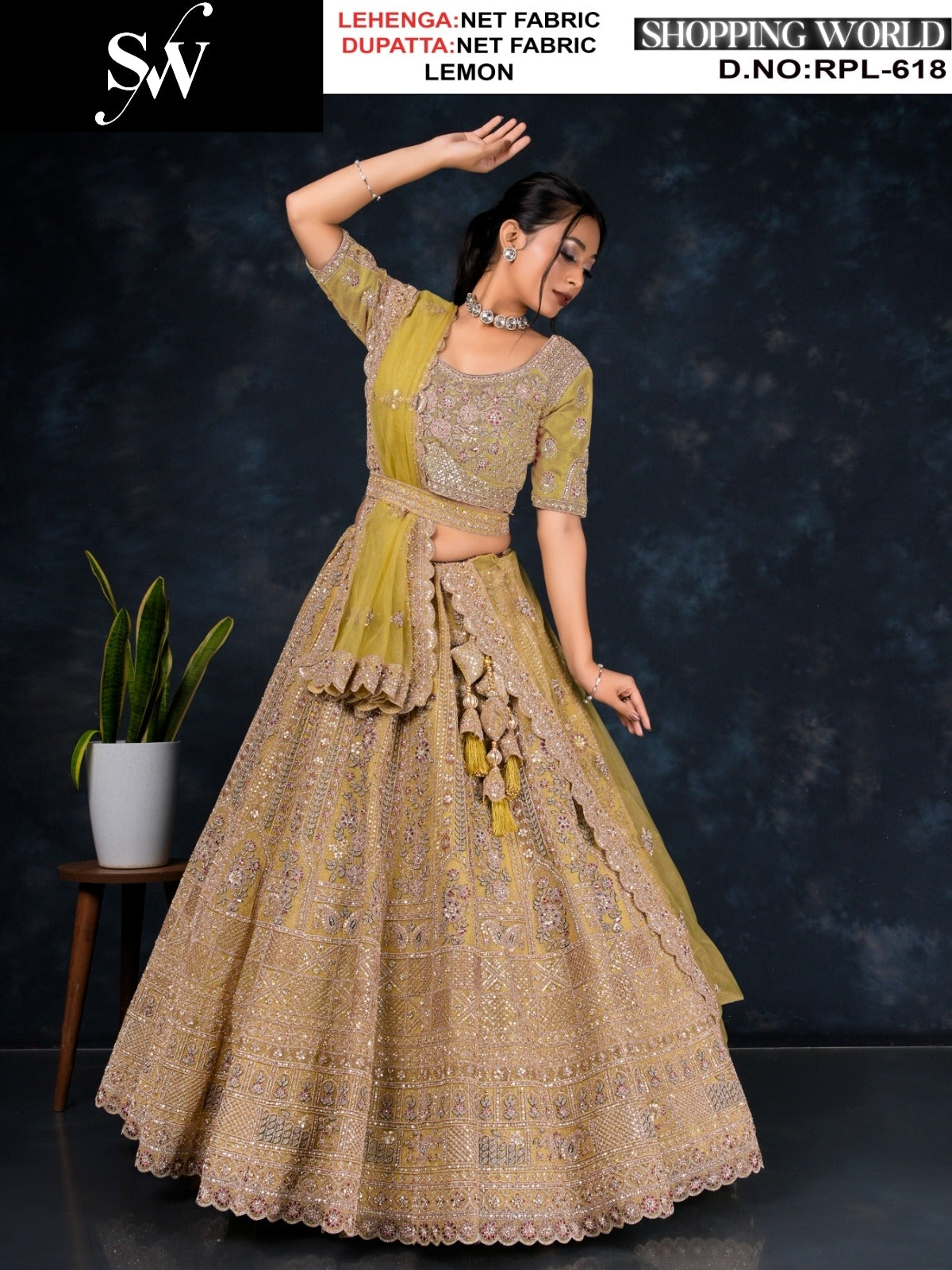 Tremendous golden Chiku Net Lehenga
