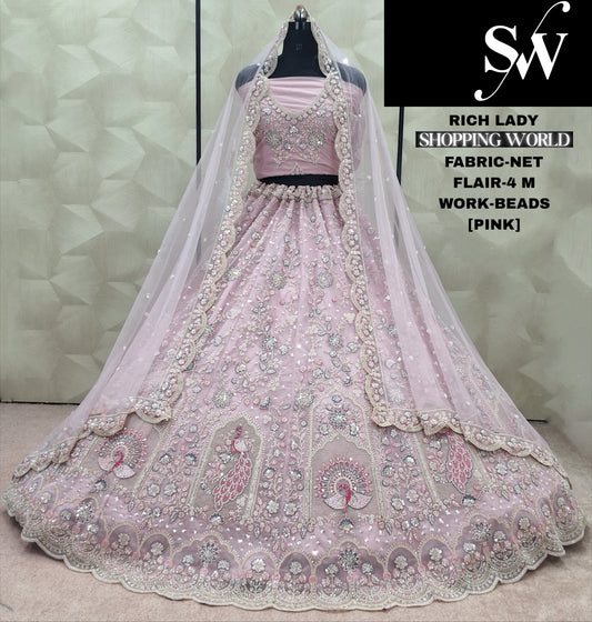 Latest Trendy Lavender peacock Beads Work Net Lehenga