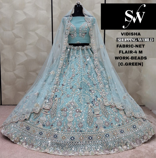 सुंदर गुलाबी मोर पंख वाली नेट लेहंगा