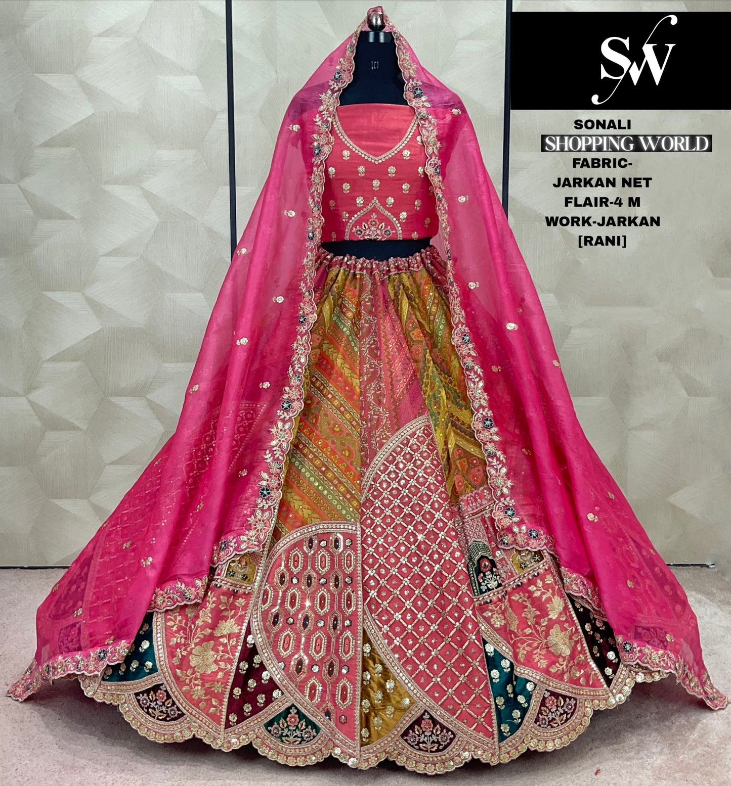 Elegante Lehenga de red Jarkan color naranja.