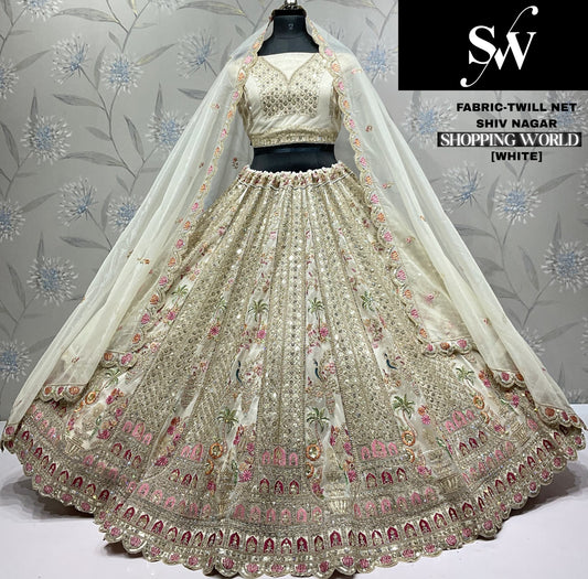 Attractive White peacock Twill Net Lehenga