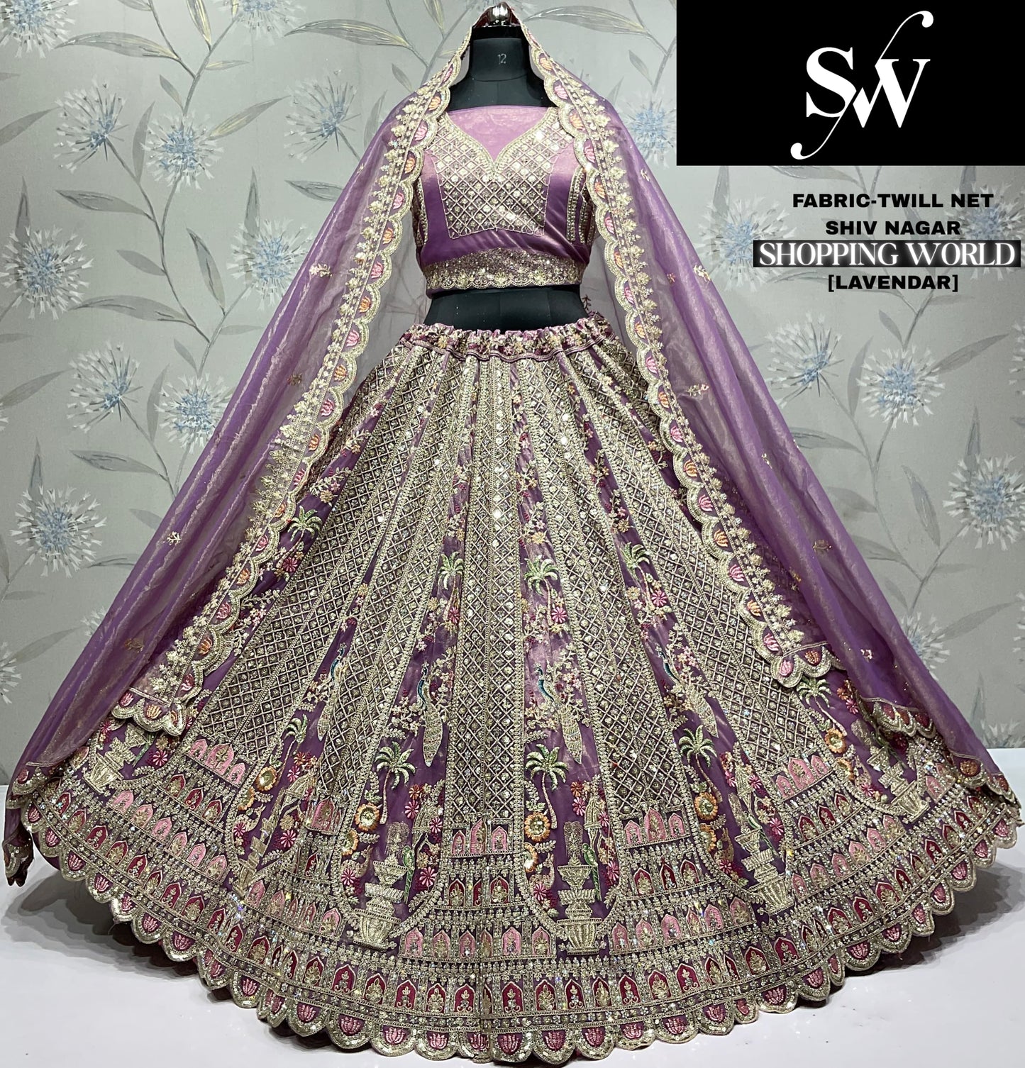 Attractive White peacock Twill Net Lehenga