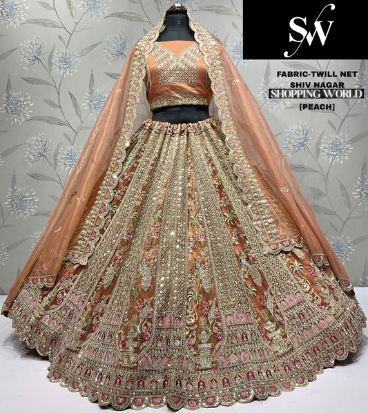 Amazing peach peacock Twill Net Lehenga