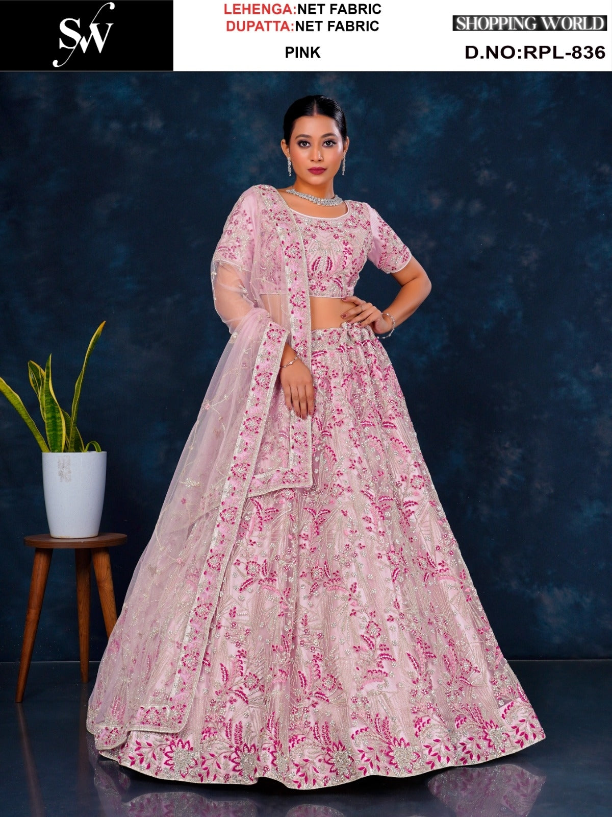 Pleasing off white Net Lehenga