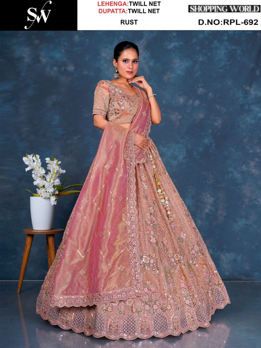 Eye catching Rust peach Twill Net Lehenga